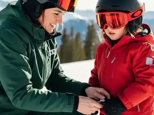 Ski instructor teaching young student - Welcoming and professional ski lessons with Skibex in Chamonix